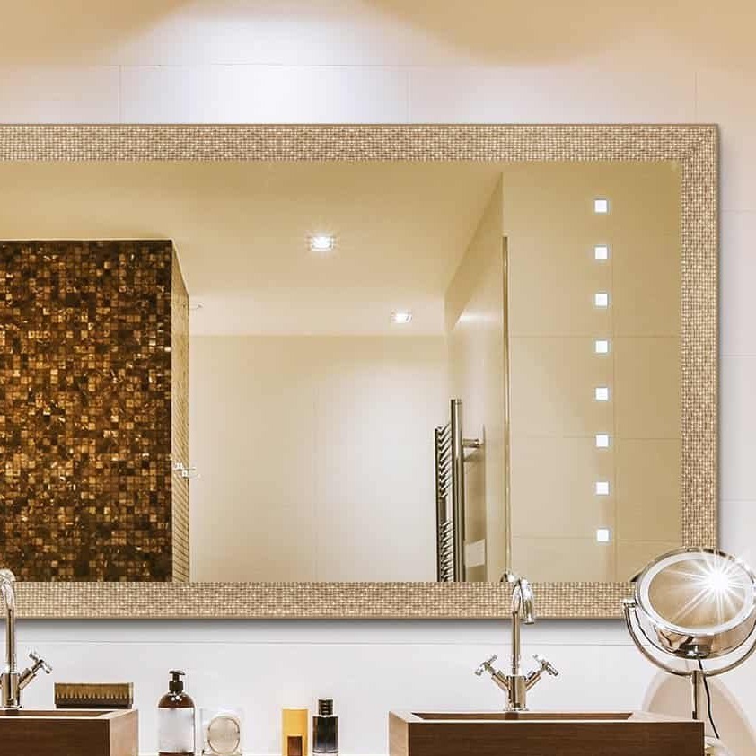 Vogue vanity mirror in a hotel bathroom